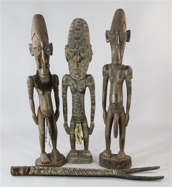 A Sepik River female ancestor figure & 4 other carved & painted figures